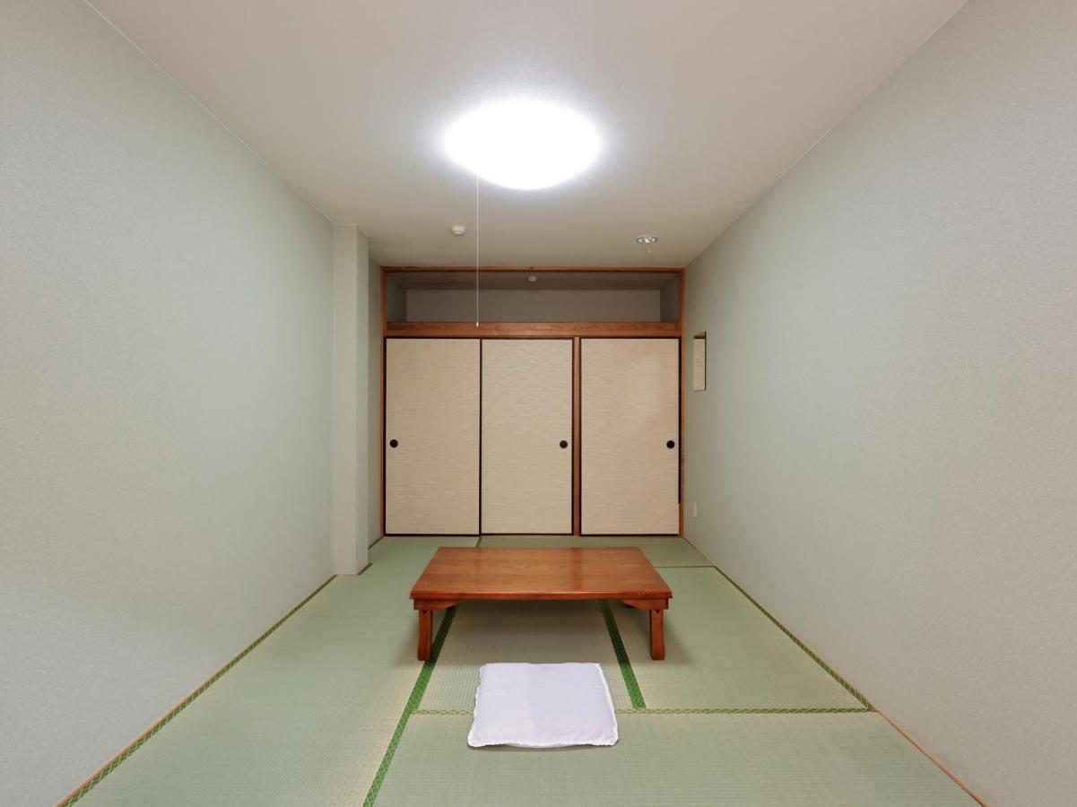 Hotel Tabist Izumi Yusen Shukuhaku Center Extérieur photo