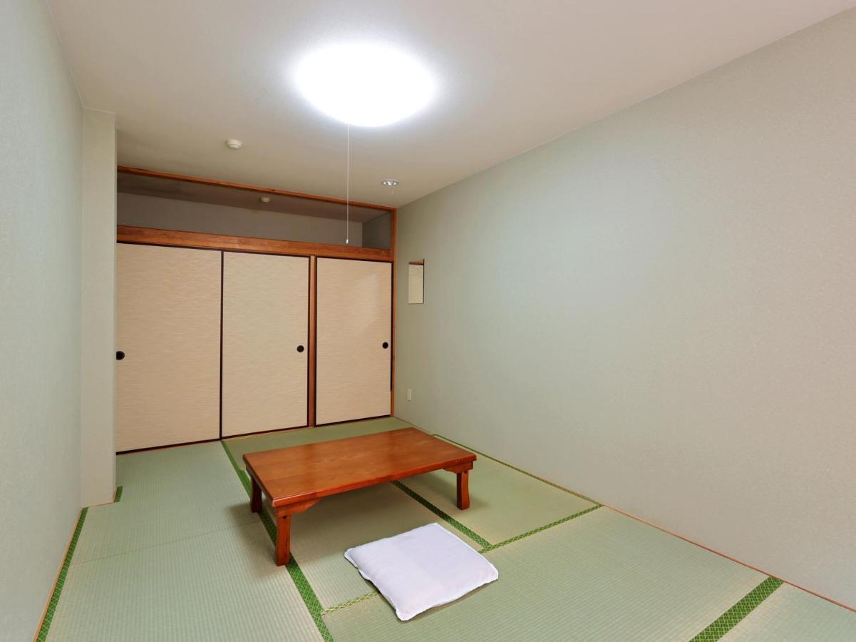 Hotel Tabist Izumi Yusen Shukuhaku Center Extérieur photo