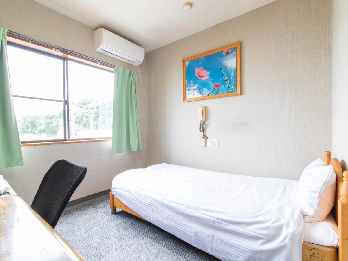 Hotel Tabist Izumi Yusen Shukuhaku Center Extérieur photo