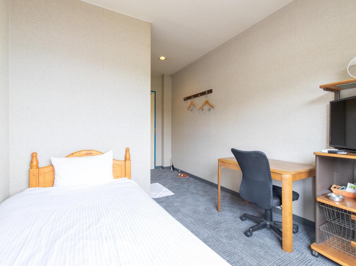 Hotel Tabist Izumi Yusen Shukuhaku Center Extérieur photo