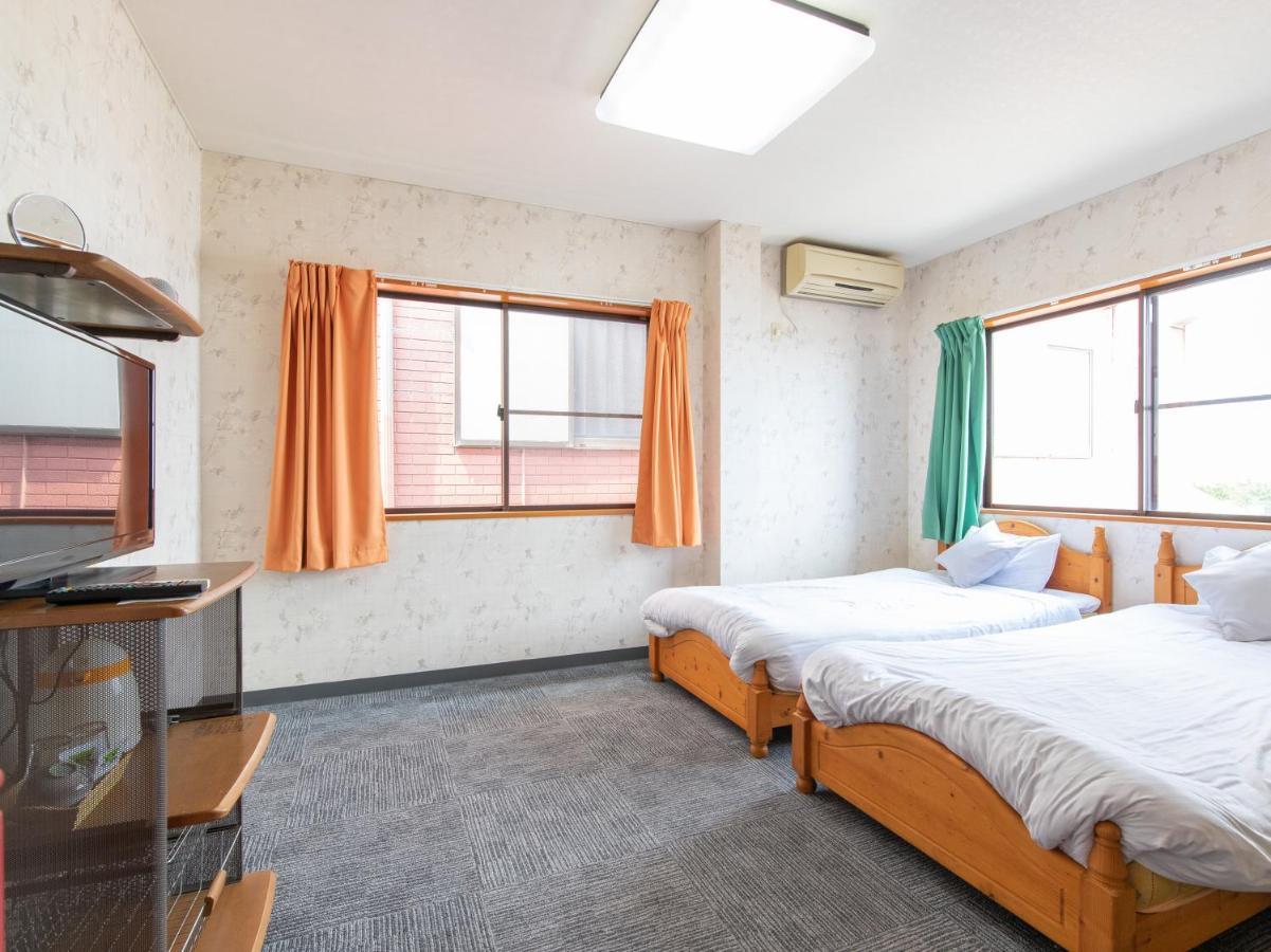 Hotel Tabist Izumi Yusen Shukuhaku Center Extérieur photo